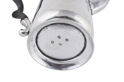 Lot 82 - A George II silver coffee pot
