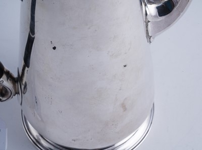 Lot 82 - A George II silver coffee pot