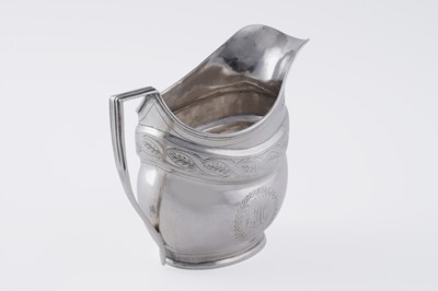 Lot 65 - A George III silver cream jug
