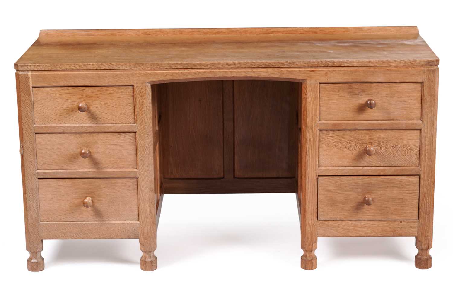 Lot 1077 - Robert ‘Mouseman’ Thompson: an oak panelled kneehole desk