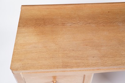 Lot 1077 - Robert ‘Mouseman’ Thompson: an oak panelled kneehole desk