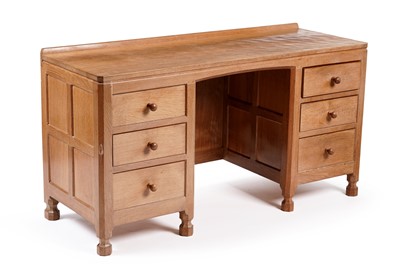 Lot 1077 - Robert ‘Mouseman’ Thompson: an oak panelled kneehole desk