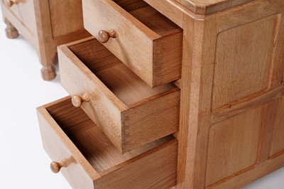 Lot 1077 - Robert ‘Mouseman’ Thompson: an oak panelled kneehole desk