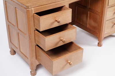 Lot 1077 - Robert ‘Mouseman’ Thompson: an oak panelled kneehole desk