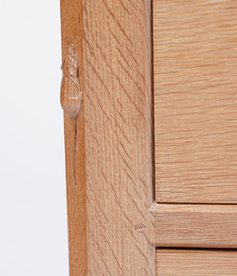 Lot 1077 - Robert ‘Mouseman’ Thompson: an oak panelled kneehole desk