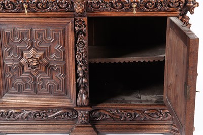 Lot 1063 - A 19th Century Northern European carved oak cabinet