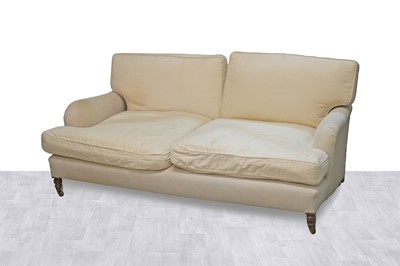 Lot 2 - In the style of Howard & Sons: a pair of substantial sofas