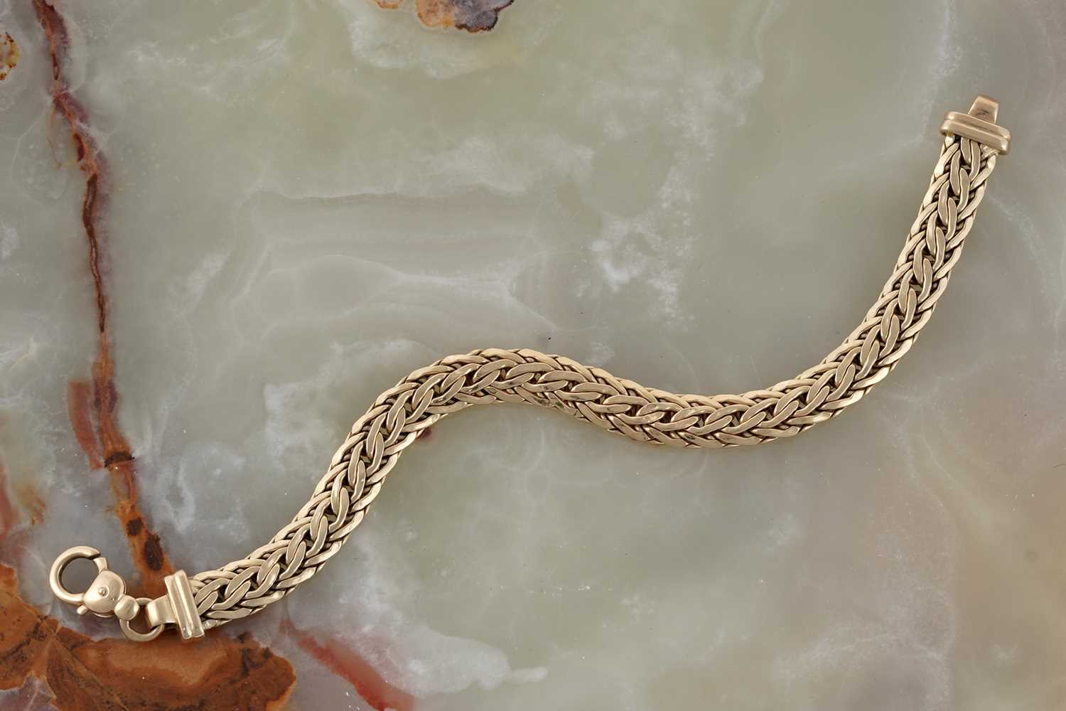 Lot 63 - An 18ct gold plaited bracelet