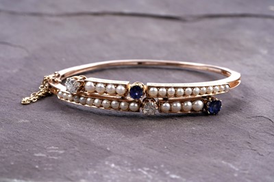 Lot 995 - A fine Victorian diamond, sapphire and half-pearl bangle