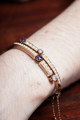 Lot 995 - A fine Victorian diamond, sapphire and half-pearl bangle