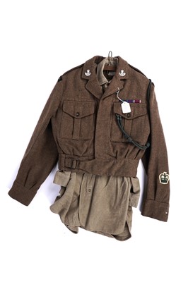 Lot 7 - A selection of British military interest uniforms