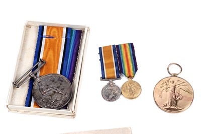Lot 8 - A pair of First World War medals and effects