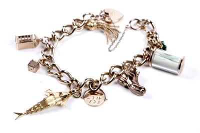 Lot 569 - A 9ct gold curb-link charm bracelet