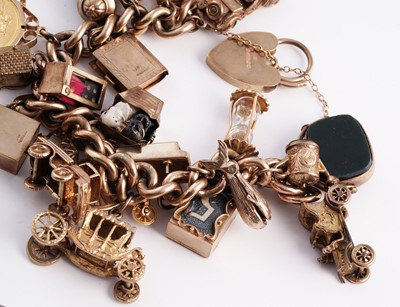 Lot 288 - A 9ct gold charm bracelet