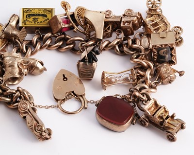 Lot 288 - A 9ct gold charm bracelet
