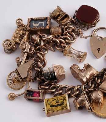 Lot 288 - A 9ct gold charm bracelet