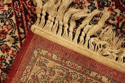 Lot 72 - An Isfahan-style; and a Turkoman-style rug