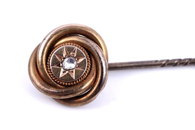Lot 28 - A Victorian Etruscan Revival diamond tie pin