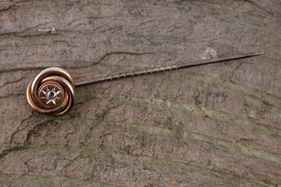 Lot 28 - A Victorian Etruscan Revival diamond tie pin