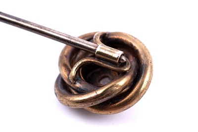 Lot 28 - A Victorian Etruscan Revival diamond tie pin