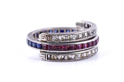 Lot 33 - A sapphire, ruby and white sapphire day-to-night ring