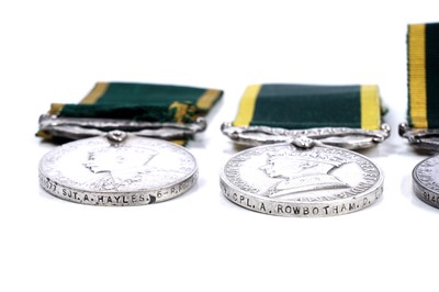 Lot 43 - Four territorial efficiency medals