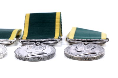 Lot 43 - Four territorial efficiency medals