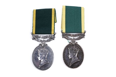 Lot 43 - Four territorial efficiency medals