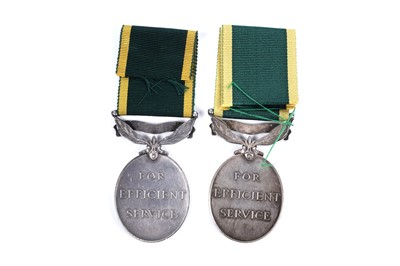 Lot 43 - Four territorial efficiency medals