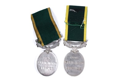 Lot 43 - Four territorial efficiency medals