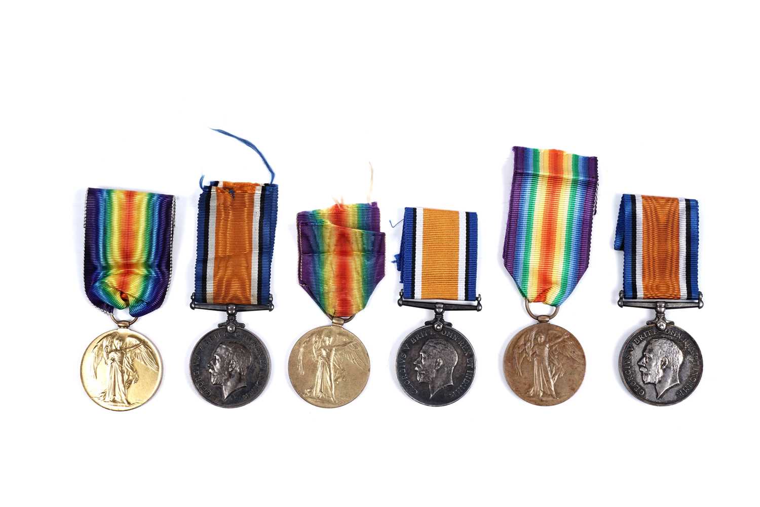 Lot 51 - Three pairs of First World War general service medals