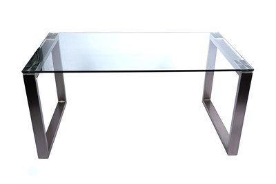 Lot 115 - A contemporary glass top dining table