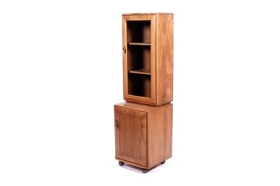 Lot 1 - Ercol: an elm ‘Windsor’ cabinet