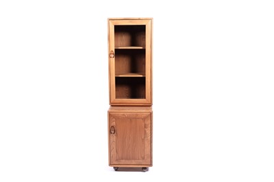 Lot 1 - Ercol: an elm ‘Windsor’ cabinet
