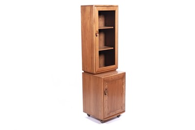 Lot 1 - Ercol: an elm ‘Windsor’ cabinet