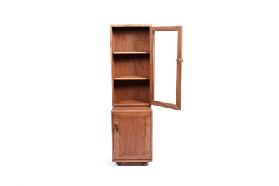 Lot 1 - Ercol: an elm ‘Windsor’ cabinet