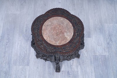 Lot 21 - An early 20th Century carved Chinese hardwood jardinière stand