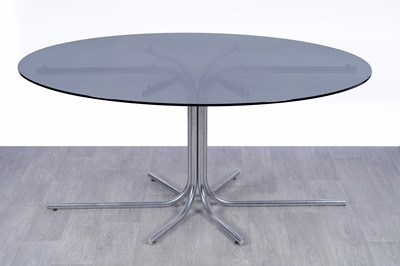 Lot 104 - A late 20th Century dining table