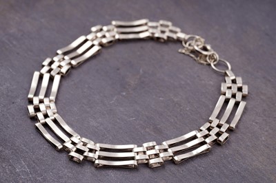 Lot 13 - A 9ct gold gate-link bracelet