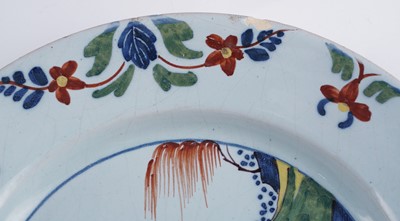 Lot 402 - A pair of Lambeth Delft plates