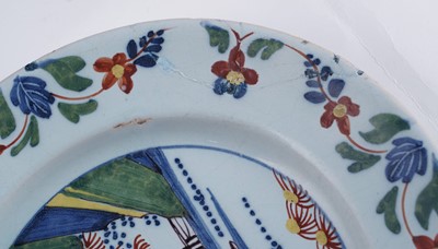Lot 402 - A pair of Lambeth Delft plates