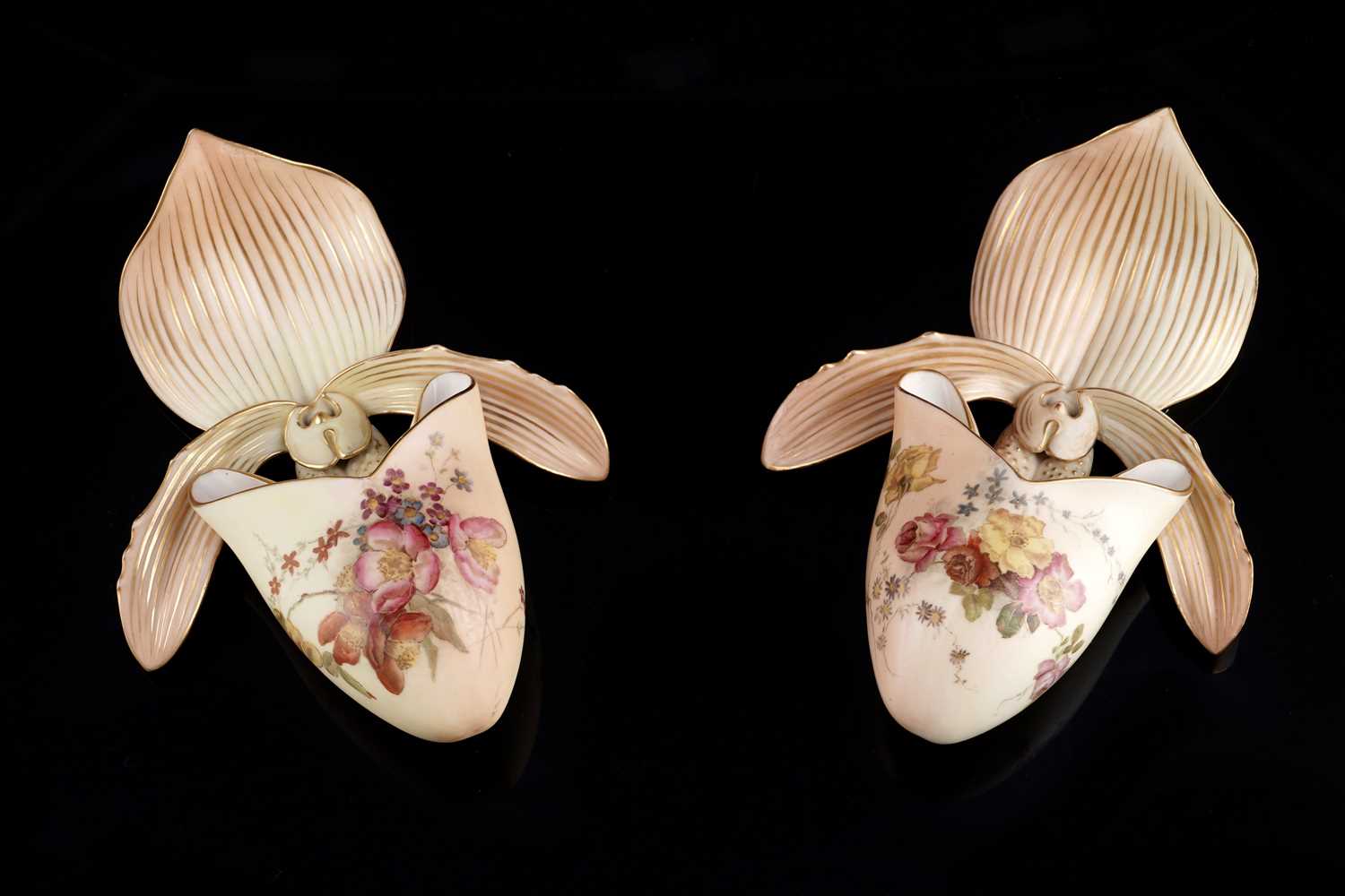 Lot 409 - A pair Royal Worcester wall pockets