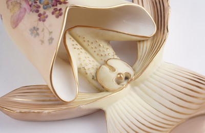 Lot 409 - A pair Royal Worcester wall pockets