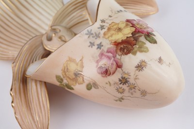 Lot 409 - A pair Royal Worcester wall pockets