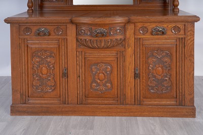 Lot 26 - An Edwardian oak mirror back sideboard