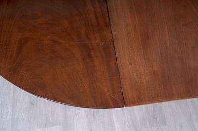 Lot 45 - A pair of Georgian mahogany D-end dining tables; and two additional leaves