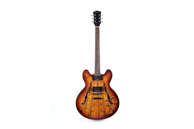 Lot 136 - A Quincy 335 style guitar