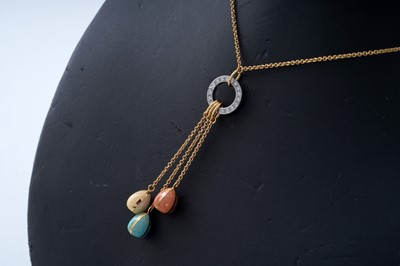 Lot 739 - Faberge: an enamel, diamond and 18ct gold egg pattern necklace