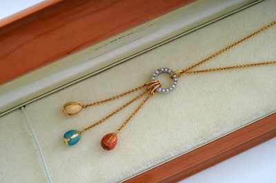 Lot 739 - Faberge: an enamel, diamond and 18ct gold egg pattern necklace