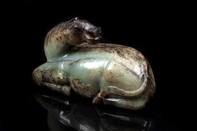 Lot 354 - A Chinese carved jade horse